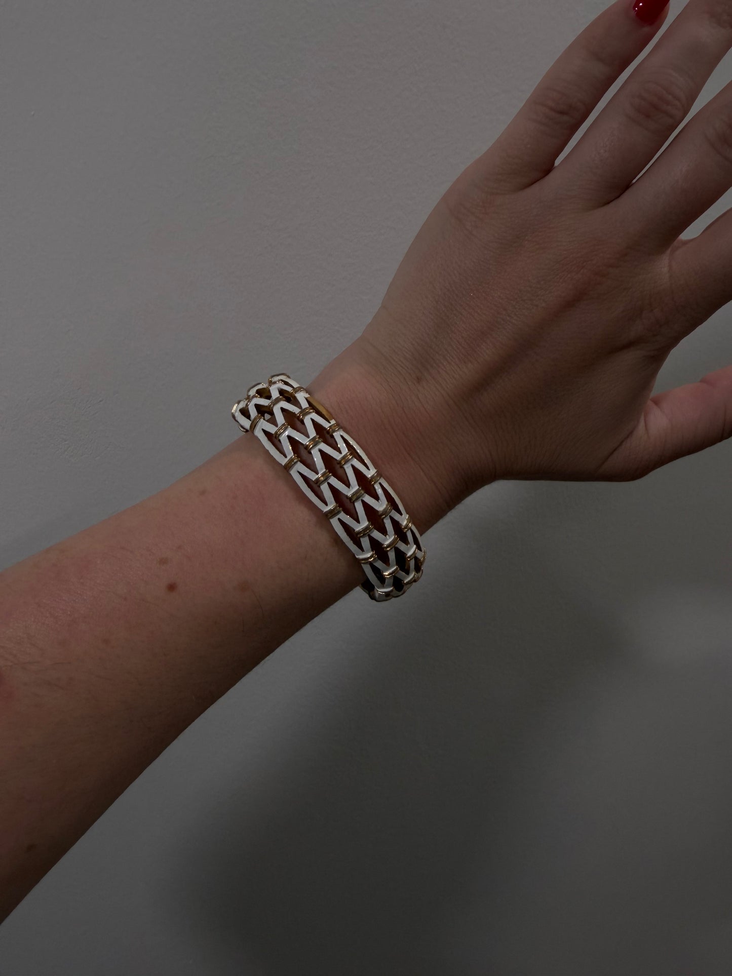 TRIFARI WHITE ENAMEL AND GOLD CLAMPER BRACELET