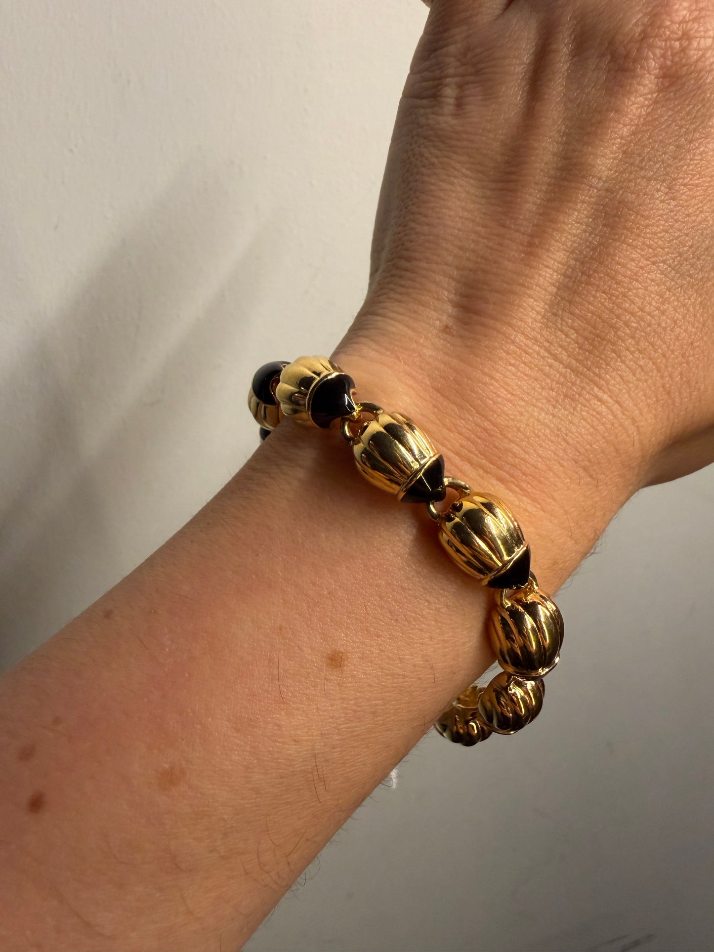 JOAN RIVERS BLACK ENAMEL AND GOLD DOME LINK BRACELET