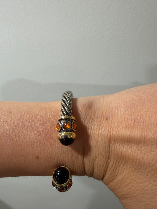 UNSIGNED SILVER WITH ORANGE FAUX GRIPOX TWISTED OPEN BANGLE