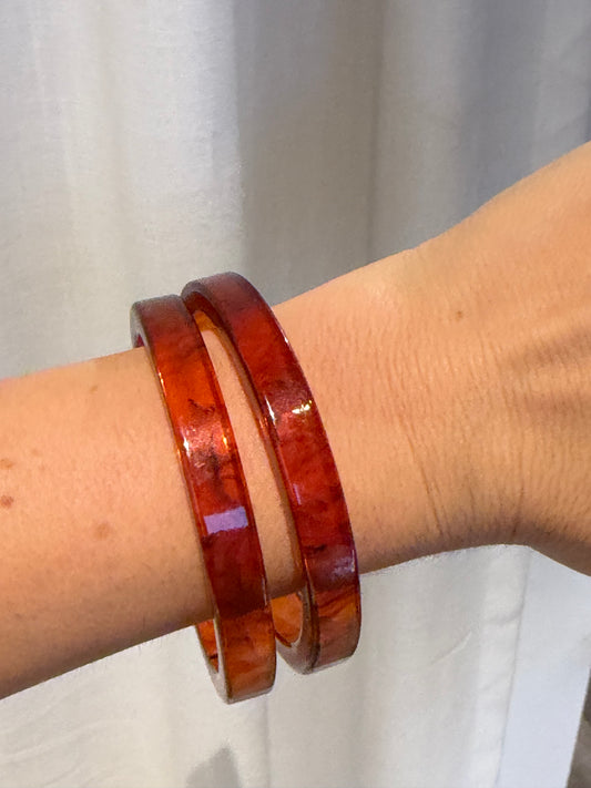 TWO FAUX TORTOISE LUCITE BANGLES